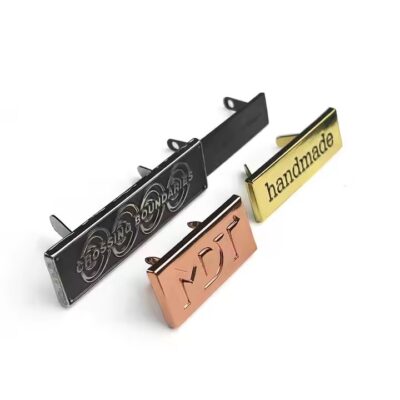 Custom etched brass label with strong adhesive backing for industrial use