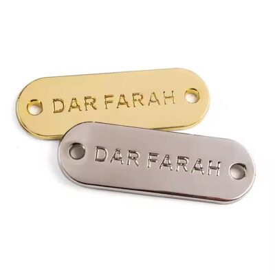 Custom etched brass label with strong adhesive backing for industrial use