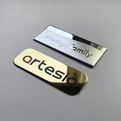 Custom printed metal nameplate with industrial logo and instruction details

