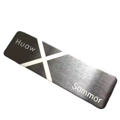 Embossed screen printed aluminum label with permanent adhesive for industrial use