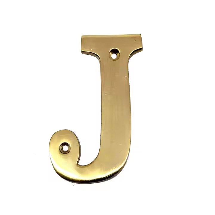 Artistic engraved brass label with custom design