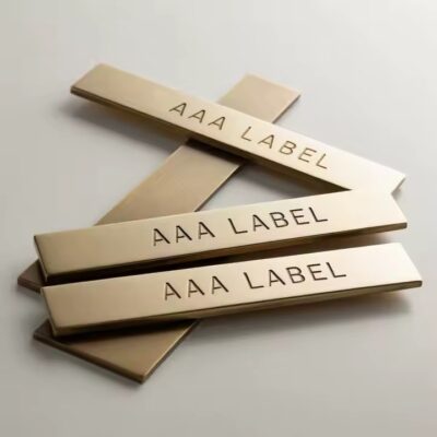 Durable embossed metal label for premium product branding