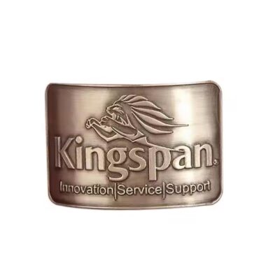 Custom brass brand logo label with detailed engraving

