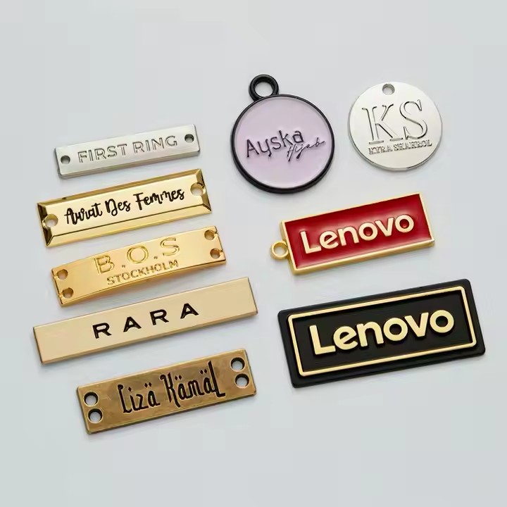 Custom brass label attached to a luxury handbag