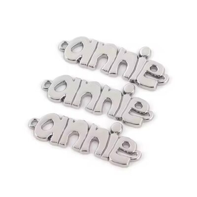 Custom engraved letter metal label with precise lettering