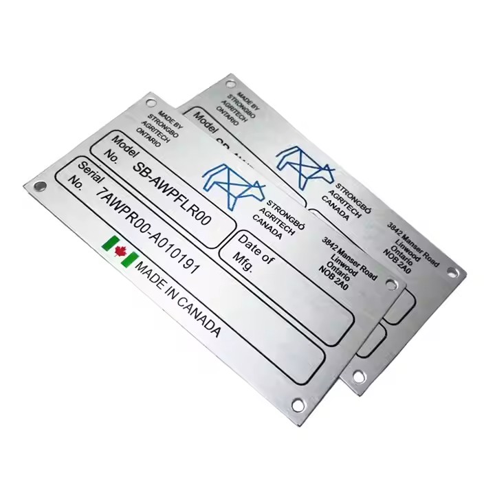 Custom industrial metal label attached to heavy machinery
