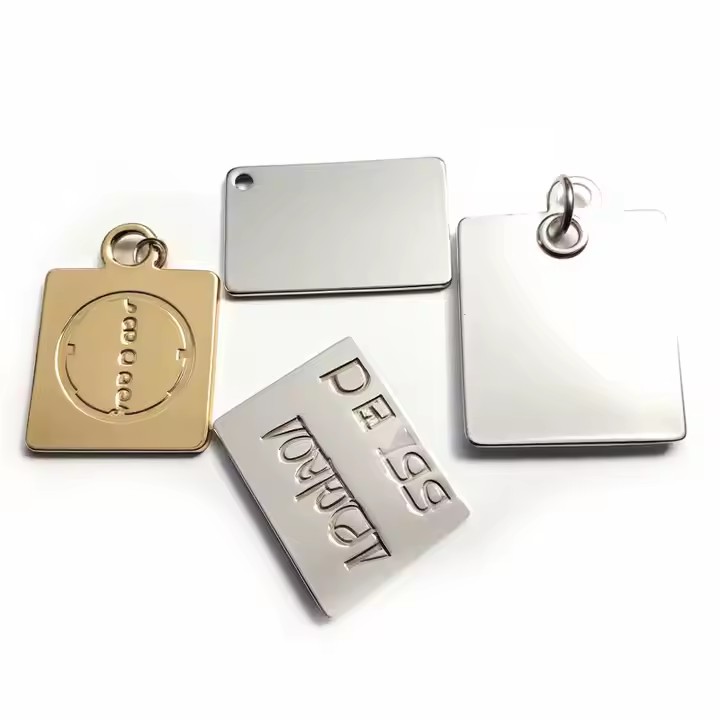 Custom engraved metal label for garment accessories
