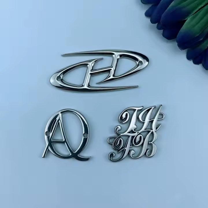 High-quality custom metal brand logo tag for garments and packaging