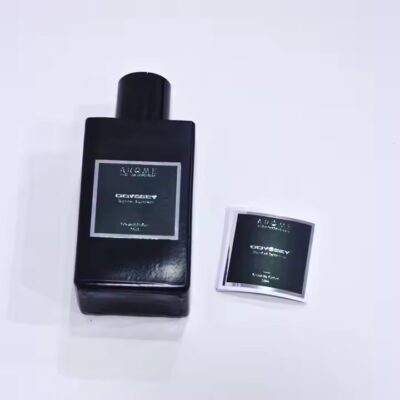 Custom metal adhesive label on a luxury perfume bottle