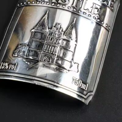 Custom embossed metal wine bottle label