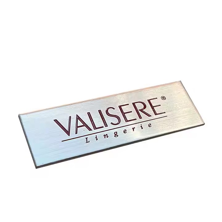 Custom engraved stainless steel tag with logo