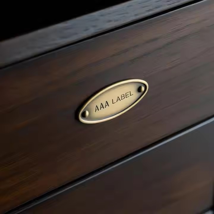 Custom engraved metal tags for furniture decoration and branding