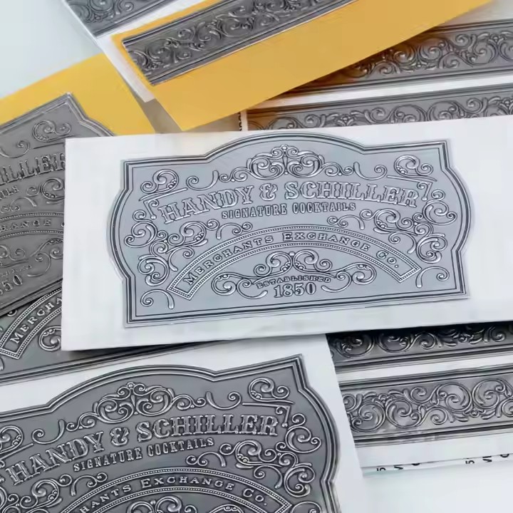 Custom metal wine bottle label with luxury branding