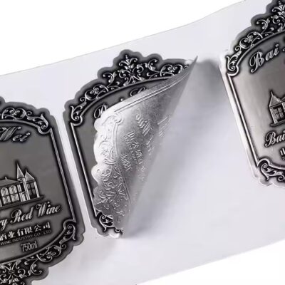 Custom decorative metal adhesive label in unique shape for packaging

