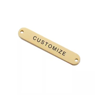 Close-up of a custom durable laser engraved metal label showing fine detail and durability