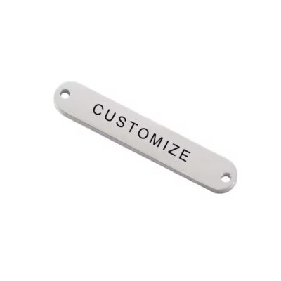 Close-up of a custom durable laser engraved metal label showing fine detail and durability