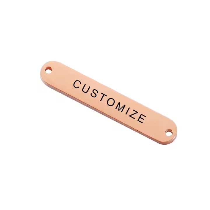 Close-up of a custom durable laser engraved metal label showing fine detail and durability