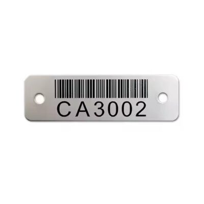 Durable fire-resistant metal plant barcode label displayed in outdoor garden or forestry use