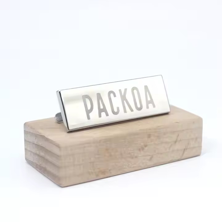 Laser engraved handbag metal tag with custom logo for luxury branding