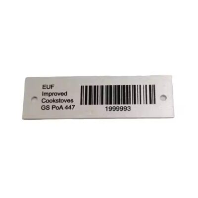 Weather-resistant metal plant barcode label attached to a garden plant or tree