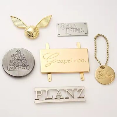 Custom metal tags with engraved letters for stylish handbag decoration