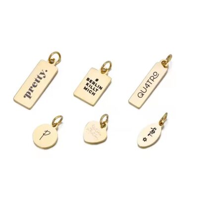 Custom laser engraved metal tag with pre-attached jump ring for product labeling