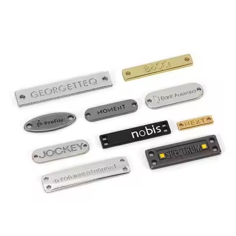 Durable washable laser engraved metal tag attached to clothing and bags