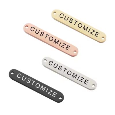 Durable washable laser engraved metal tag attached to clothing and bags